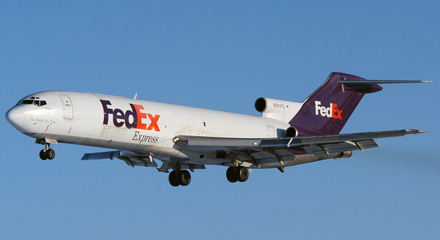 A FedEx 727-200F freighter lands at Ottawa Macdonald-Cartier International Airport in 2006 (John Davies)